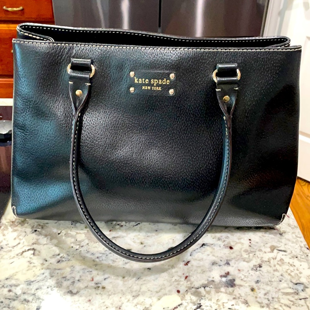 A beautiful black Kate Spade purse. Great size.